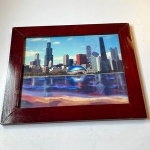 The beautiful Chicago Skyline with the Bean print. It’s matted and framed.